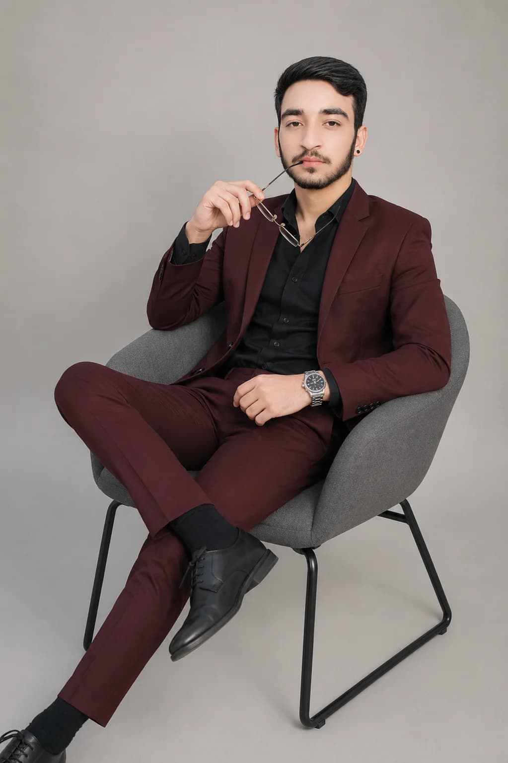 Burgundy Suit Thoughtful Male Studio Portrait Prompt