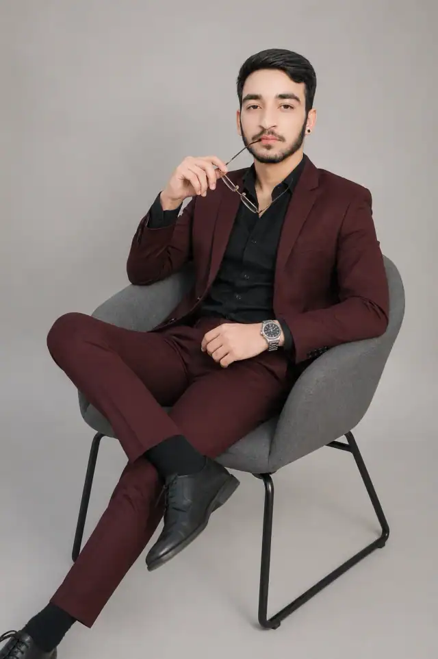 Burgundy Suit Thoughtful Male Studio Portrait Prompt
